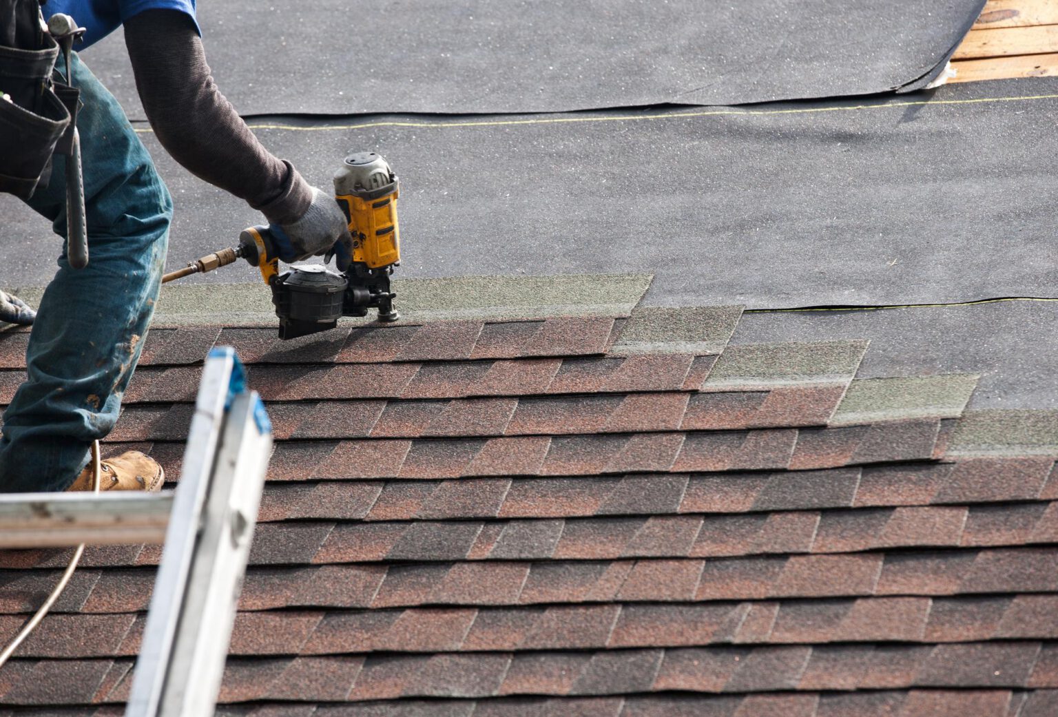American residential asphalt-shingle roof installation in progress