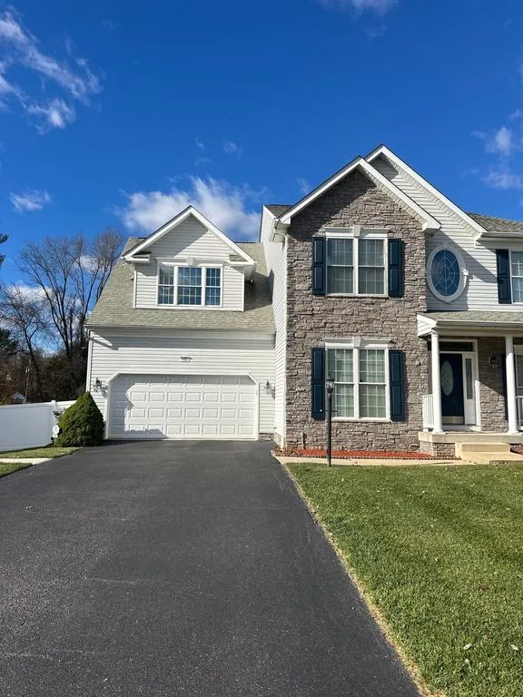 American residential asphalt-shingle roof representing Howard County service areas
